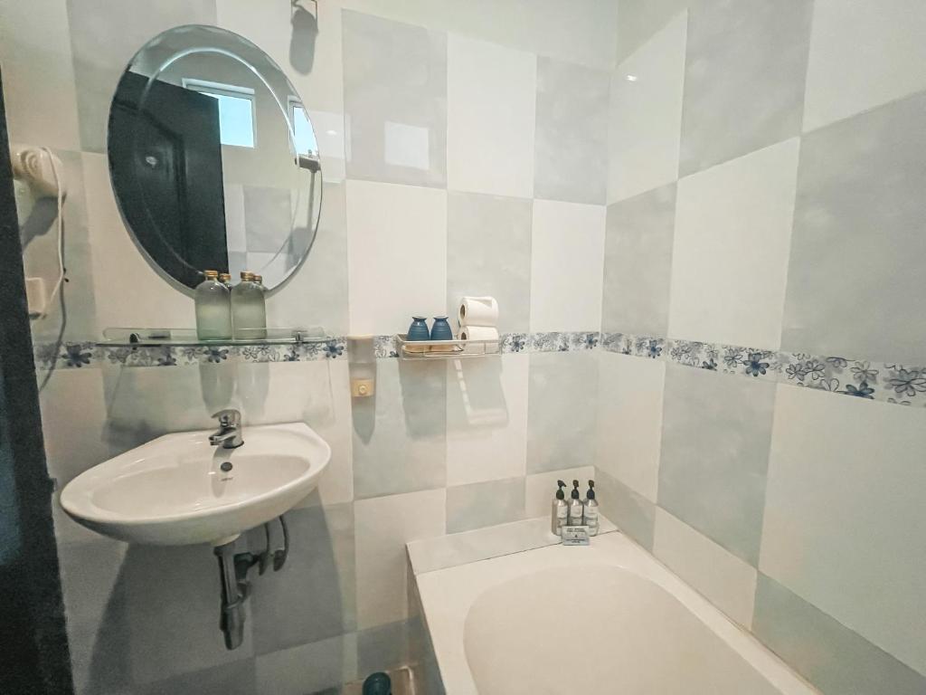 Cozy window seat with Khmer cushions